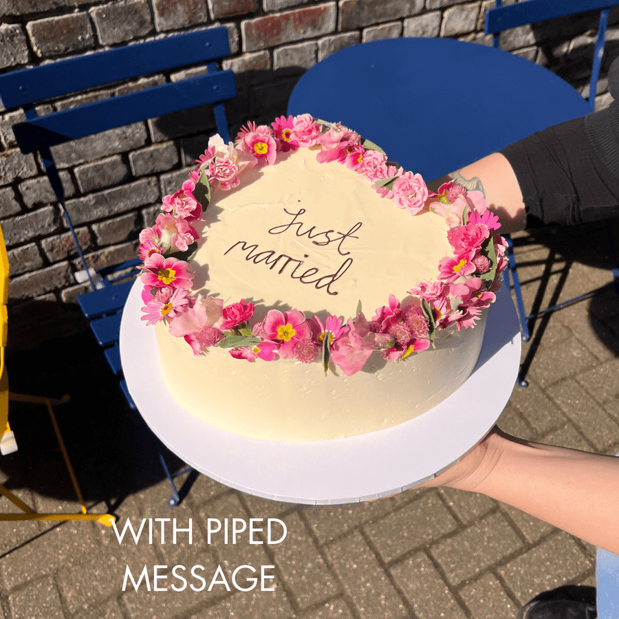 Heart Shaped Cake Just Married decorated with pink edible flowers