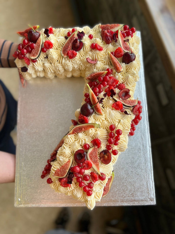 Number 7 Cake decorated with fruits. London