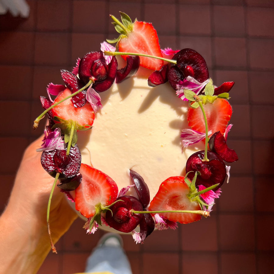 Summer Dream cake decorated with strawberries, cherries and edible flowers, Londo